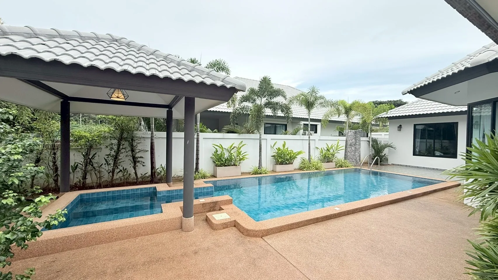 Pool and shaded pavilion in the rainy season